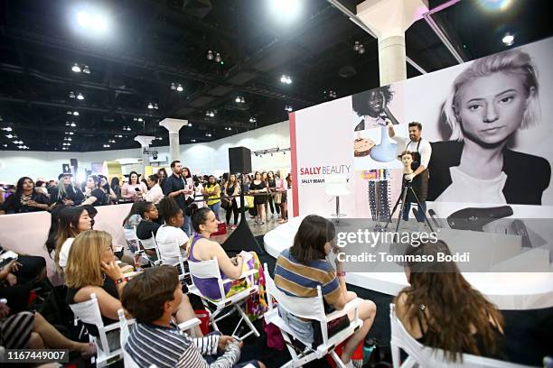 Attendees watch a demonstration during Beautycon Festival Los Angeles 2019 at Los Angeles Convention Center on August 11, 2019 in Los Angeles,...