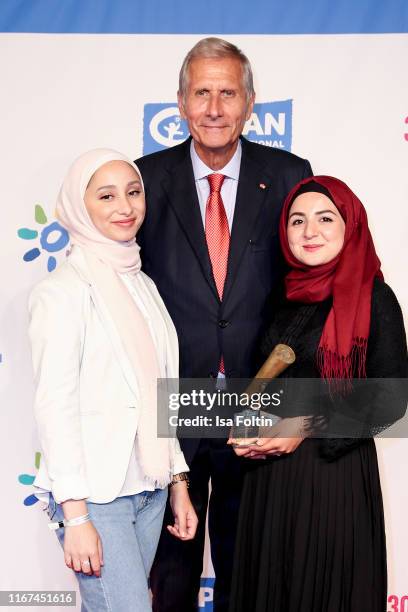 German news anchor Ulrich Wickert with the award winner "Youth advocates" during the Ulrich Wickert Award for Childen's Rights at Tipi am Kanzleramt...