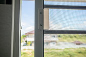 Open mosquito net wire screen on house window protection against insect