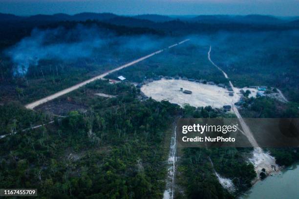 Smoke rises from inside the Indigenous Land Bau, in Novo Progresso, state of Para, north of Brazil, this Thursday, August 28th, days after the...