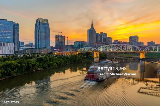 nashville tennessee skyline at night - nashville stock pictures, royalty-free photos & images