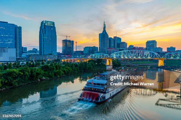 nashville tennessee skyline at night - nashville stock pictures, royalty-free photos & images