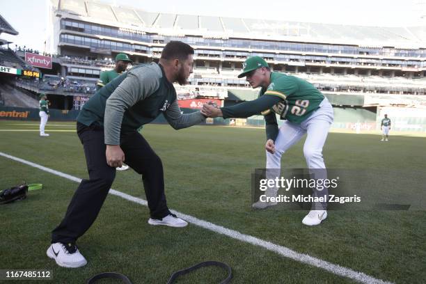 Strength & Conditioning Coach Josh Cuffe and Matt Chapman of the News Photo - Getty Images