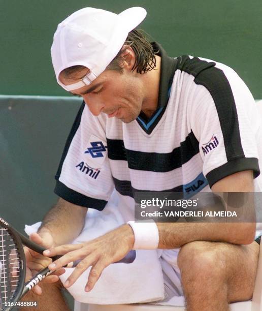 Brazilian tennis player, Fernando Meligeni reflects on his game against Slavic Dominik Hhrbaty for the Davis Cup 07 April 2000, in Rio de Janeiro,...