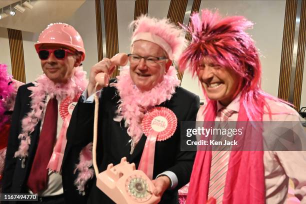 Scottish Liberal Democrat leader Willie Rennie , Conservative interim leader Jackson Carlaw , and Labour leader Richard Leonard dress up in pink in...