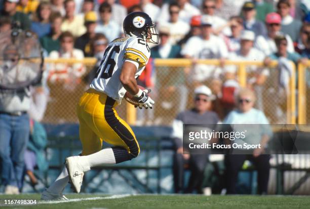 Rod Woodson of the Pittsburgh Steelers runs with the ball during an NFL football game circa 1992. Woodson played for the Steelers from 1987-96.