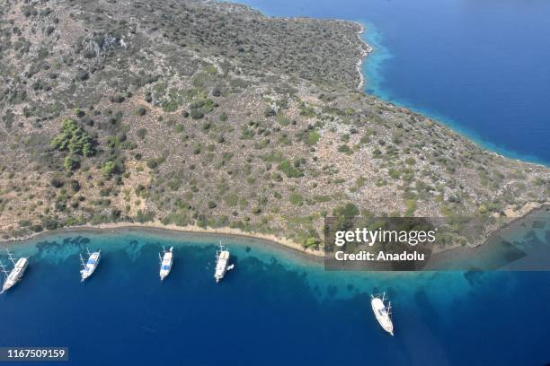 An aerial view of vessels anchored near the route where test drives take place in the shakedown lap within the World Rally Championship at Hisaronu...