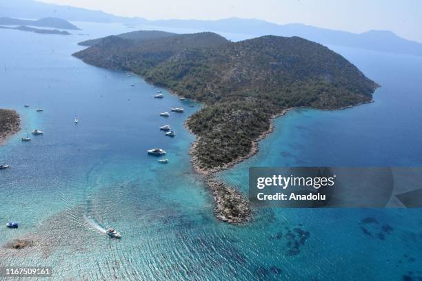 An aerial view of vessels anchored near the route where test drives take place in the shakedown lap within the World Rally Championship at Hisaronu...
