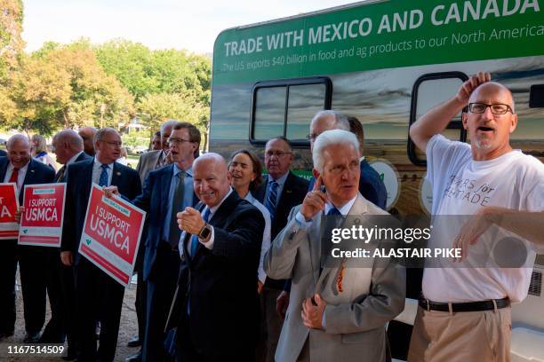 Representative Kevin Brady poses for photos with his colleagues after a rally for the passage of the US-Mexico-Canada Agreement near the US Capitol...