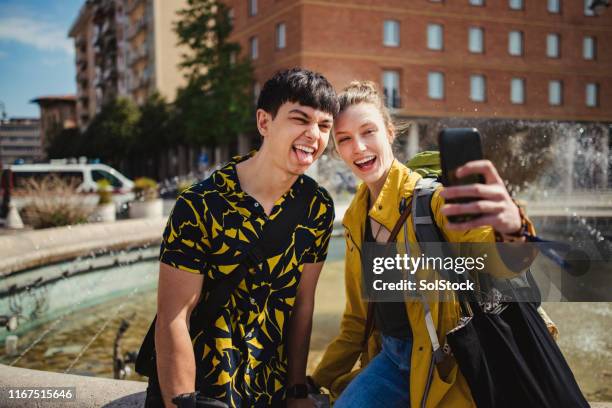 friends taking a selfie in pisa - man tongue stock pictures, royalty-free photos & images