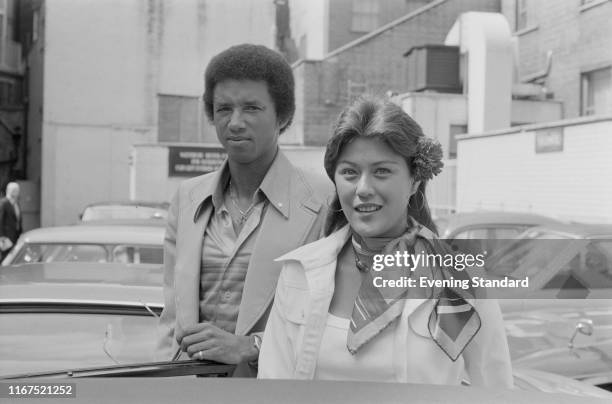 American professional tennis player Arthur Ashe with Lois Wise in London, UK, 22nd June 1976.