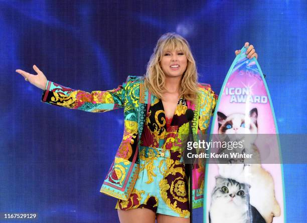 Taylor Swift accepts the Teen Choice Icon Award onstage during Fox's Teen Choice Awards at the Hermosa Beach Pier on August 11, 2019 in Hermosa...