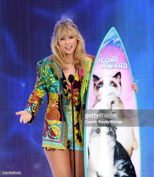 Taylor Swift accepts the Teen Choice Icon Award onstage during Fox's Teen Choice Awards at the Hermosa Beach Pier on August 11, 2019 in Hermosa...