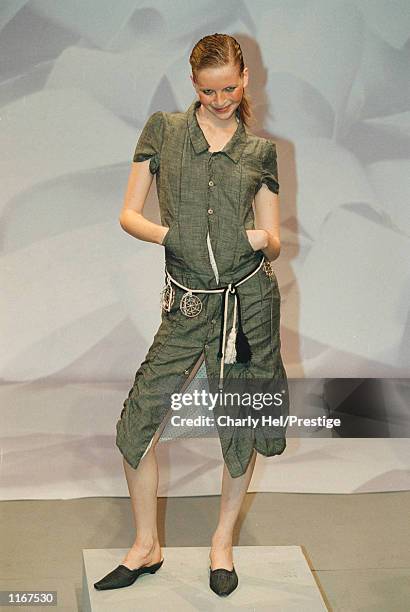 Model wears an outfit from the Marithe + Francois Girbaud Spring/Summer 2002 ready-to-wear fashion collection October 11, 2001 in Paris.