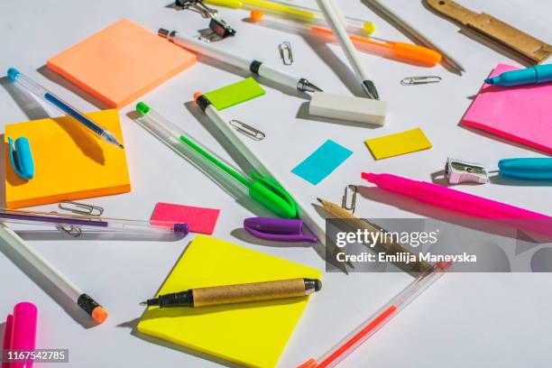 group of school or office supplies on white table - stationary desk stock pictures, royalty-free photos & images