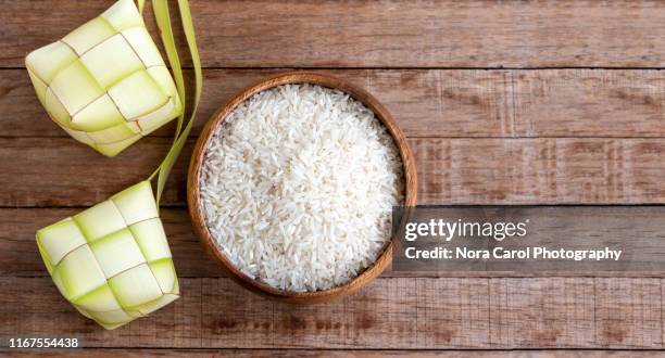 ketupat or rice dumpling malaysian food - muslims prepare for eid in indonesia stock-fotos und bilder