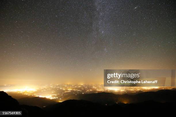 the pic du midi de bigorre observatory (france) at night - observatorium stockfoto's en -beelden