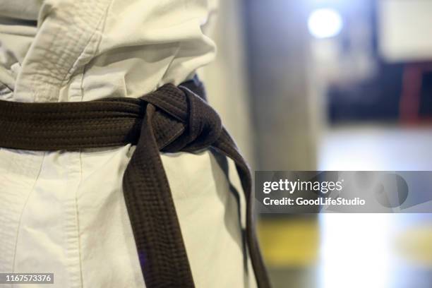 black belt - arts martiaux stock pictures, royalty-free photos & images