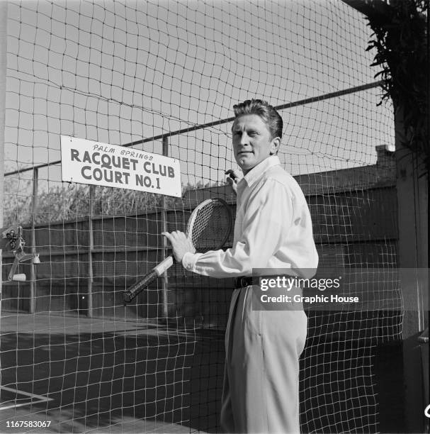 American actor Kirk Douglas at Racquet Club Court Number 1 in Palm Springs, California, 1952.