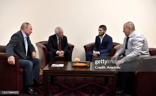 Russian President Vladimir Putin , Head of the Republic of Dagestan Vladimir Vasilyev meet with Russian mixed martial artist, UFC Lightweight...