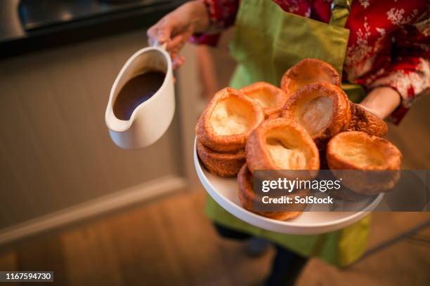 serving food at home - yorkshire pudding stock pictures, royalty-free photos & images
