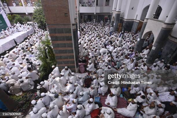 People congregate during a meeting for the resolution on Kashmir adopted by General Council of Jamait Ulama-E-Hind at its central office at ITO on...