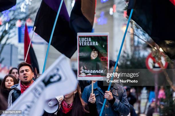 Activists of Chilean human rights organizations hold portraits of people disappeared during the military dictatorship to commemorate the 46th...