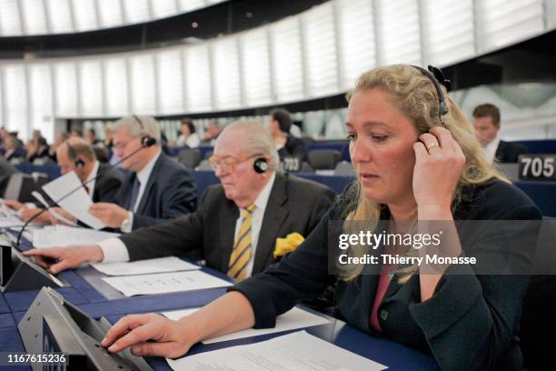 Bruno Gollnisch , Jean-Marie Le Pen and Marine Le Pen from the National Front attend a session of the European Parliament on July 20, 2004 in...