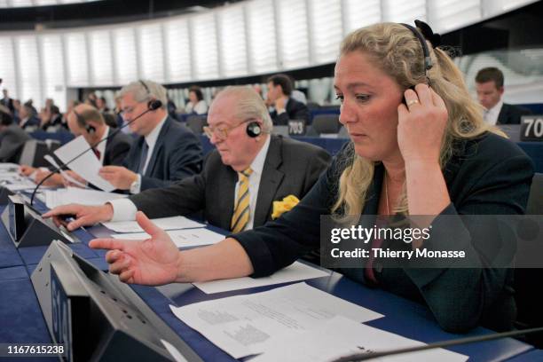 Bruno Gollnisch , Jean-Marie Le Pen and Marine Le Pen from the National Front attend a session of the European Parliament on July 20, 2004 in...