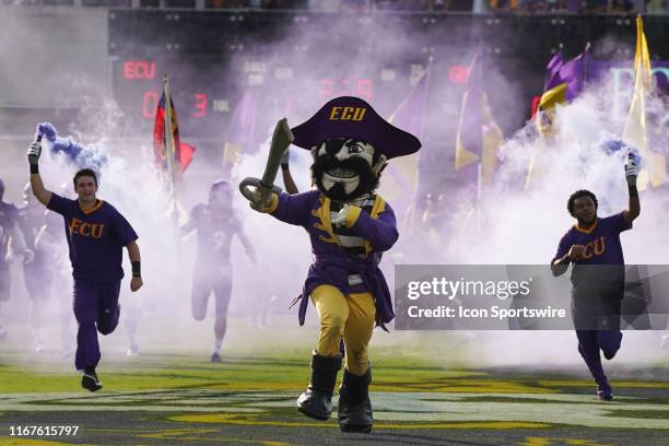 East Carolina Pirates mascots PeeDee takes the field before a game between the East Carolina Pirates and the Gardner-Webb Runnin' Bulldogs at...
