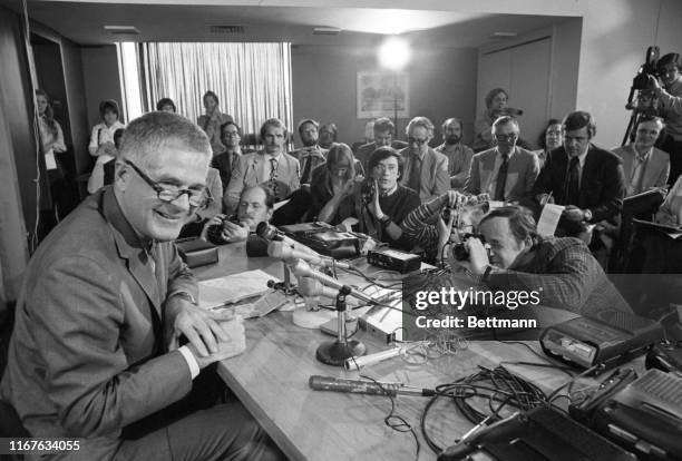 Harvard law professor Archibald Cox was teh center of the attention as he held press conference in Harvard University News Office after being named...