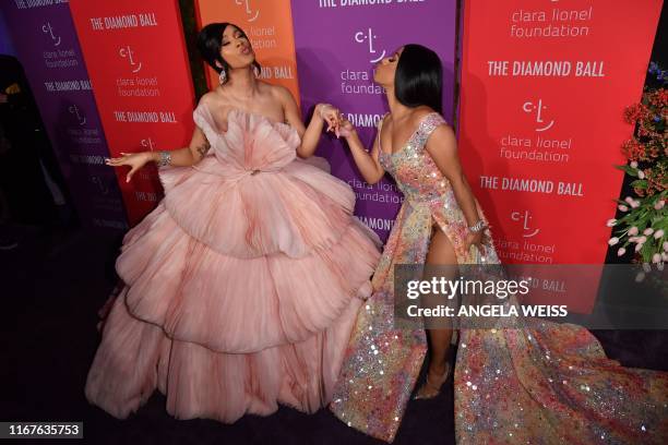 Rapper Cardi B and her sister Hennessy Carolina arrive for Rihanna's 5th Annual Diamond Ball Benefitting The Clara Lionel Foundation at Cipriani Wall...