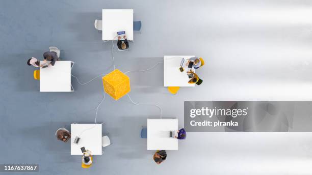 overhead view of five workstations - desk from above stock pictures, royalty-free photos & images