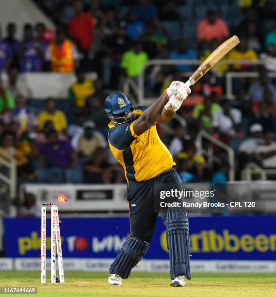 In this handout image provided by CPL T20, Rahkeem Cornwall of of St Lucia Zouks bowled by Shamar Springer of Jamaica Tallawahs during match 9 of the...