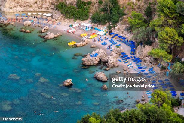 anthony quinn bay, kallithea, rhodes, greece - insel rhodos inselgruppe dodekanes stock-fotos und bilder