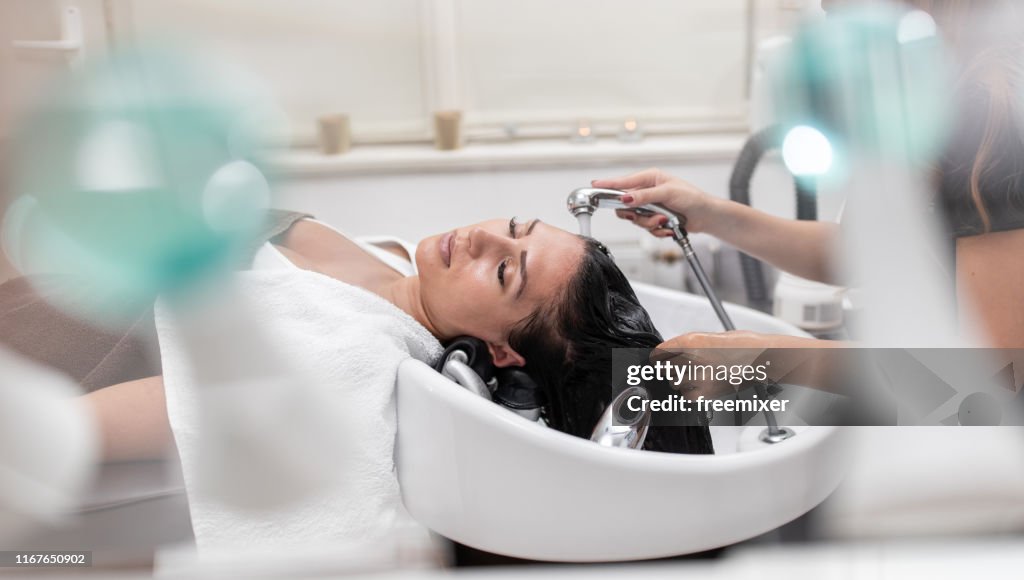 Hair styling in professional saloon