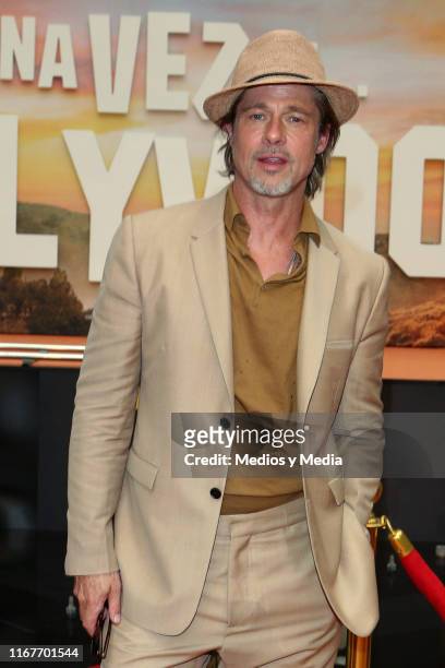 Brad Pitt poses for photos during the premiere of 'Once Upon a Time in... Hollywood' at Toreo Parque Central on August 12, 2019 in Mexico City,...