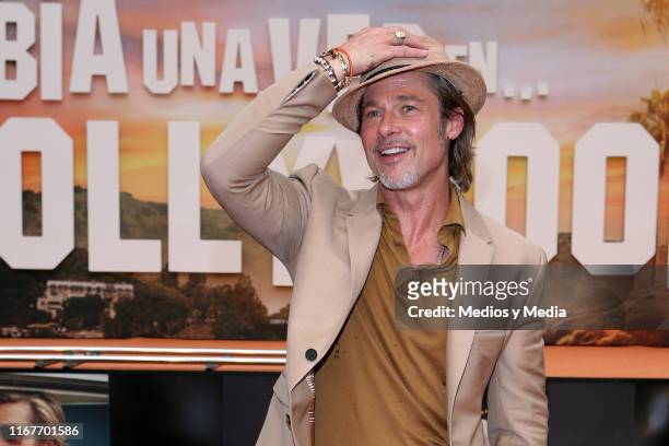 Brad Pitt poses for photos during the premiere of 'Once Upon a Time in... Hollywood' at Toreo Parque Central on August 12, 2019 in Mexico City,...