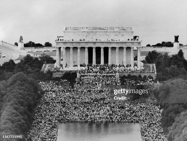 Hundreds of thousands of people are gathered for the "March on Washington for Jobs and Freedom" at the Lincoln Memorial on August 28, 1963 in...