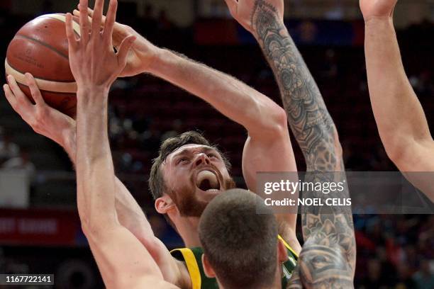 Australia's Nick Kay goes to the basket as Spain's Juan Hernangomez tries to block during the Basketball World Cup semi-final game between Australia...