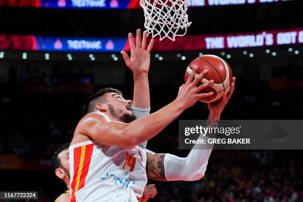 Spain's Willy Hernangomez goes for the basket during the Basketball World Cup semi-final game between Australia and Spain in Beijing on September 13,...