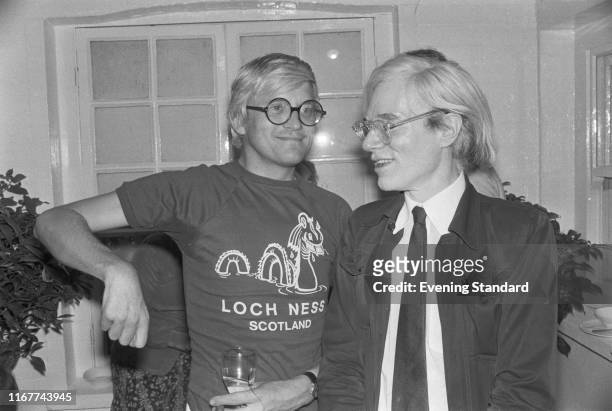 English painter, draftsman, printmaker, stage designer, and photographer David Hockney and American artist, director and producer Andy Warhol , UK,...
