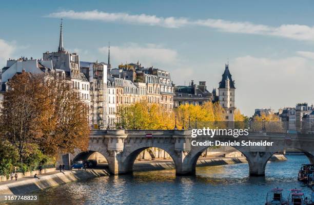 france, paris, 1st arrondissement, ile de la cite, pont-neuf on the seine river and residential buildings at the quai des orfevres - paris island stock pictures, royalty-free photos & images