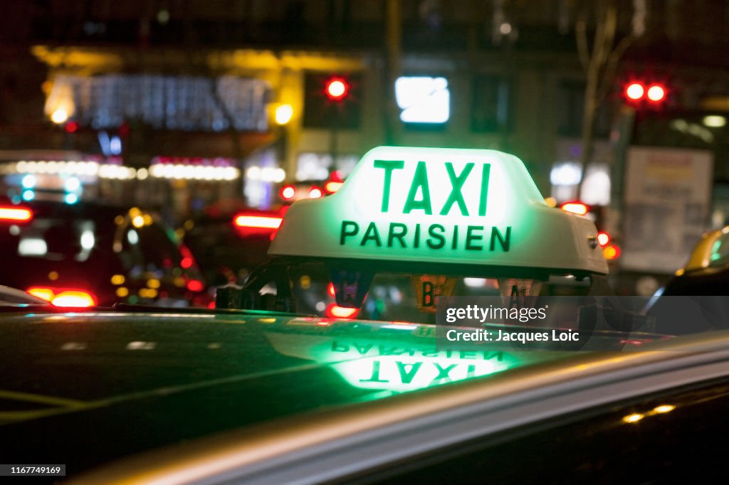 France, Paris, 3rd arrondissement, Place de la Republique, taxi satation, by night in winter.