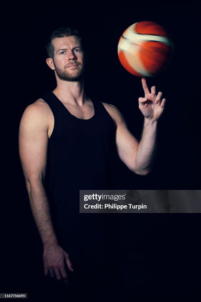 30 years old man, with basket ball