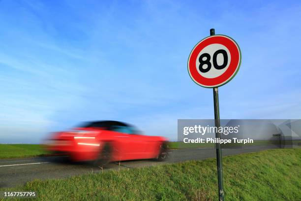 france, panel 80 km per hour - speed limit sign stock pictures, royalty-free photos & images