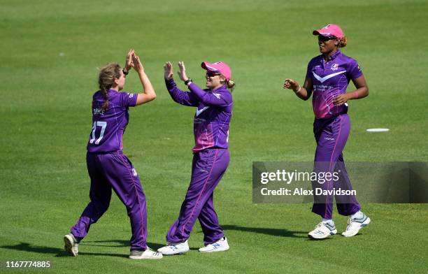 Mignon du Preez and Kathryn Bryce of Loughorough Lightning celebrate the wicket of Smriti Mandhana of Western Storm during the Kia Super League match...