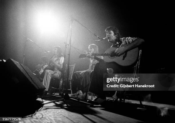 Wings perform on stage at Ahoy, Rotterdam, Netherlands, 25th March 1976. L-R Jimmy McCulloch, Denny Laine, Linda McCartney, Paul McCartney.