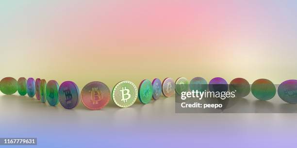 reihe von multifarbigen bitcoin s arrangiert in kurve vor buntem hintergrund - cryptocurrencies stock-fotos und bilder