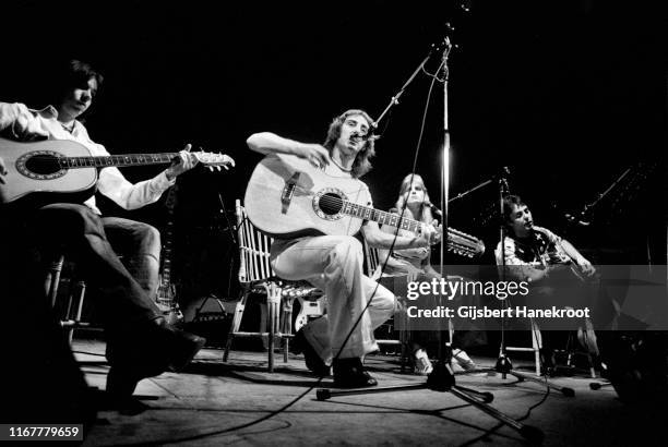 Wings perform on stage at Ahoy, Rotterdam, Netherlands, 25th March 1976. L-R Jimmy McCulloch, Denny Laine, Linda McCartney, Paul McCartney.